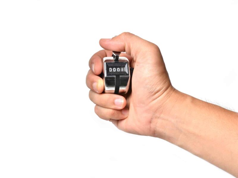 Hand holding tally counter