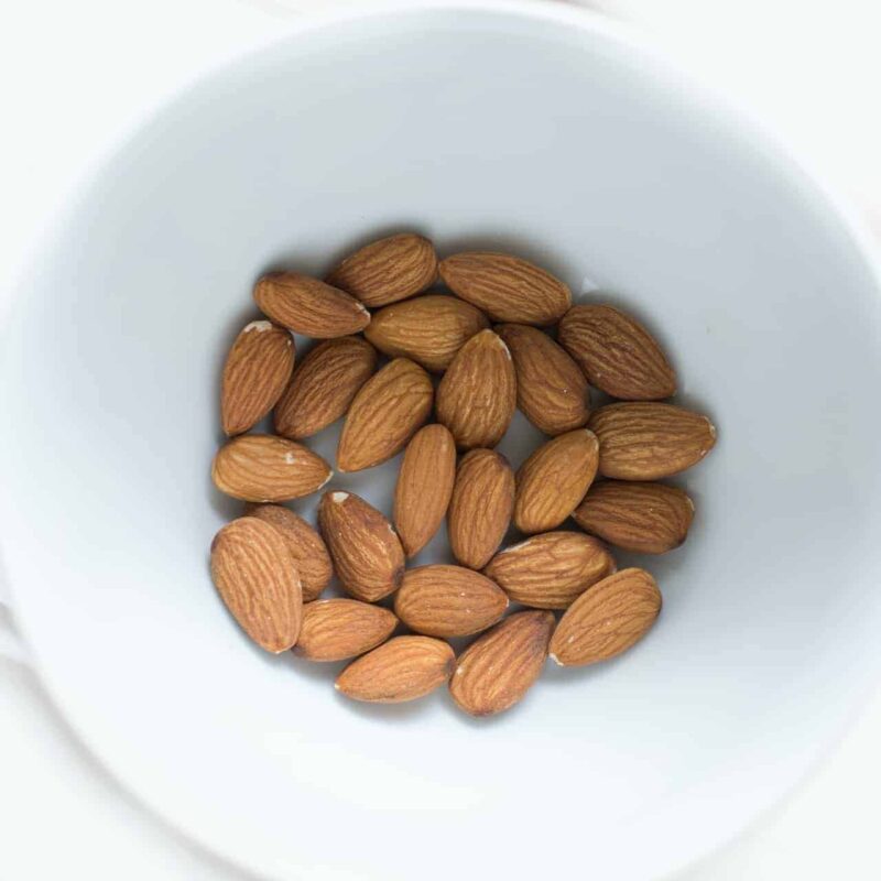 Almonds in white ceramic bowl